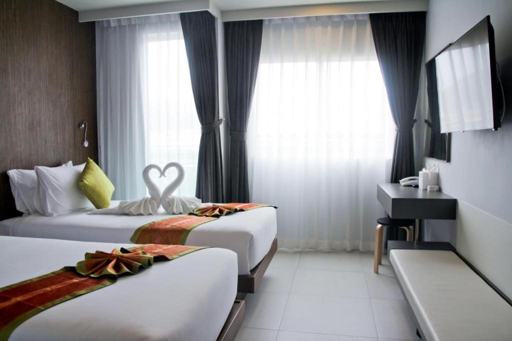 Elegancy Sansabai Hotel Patong Экстерьер фото